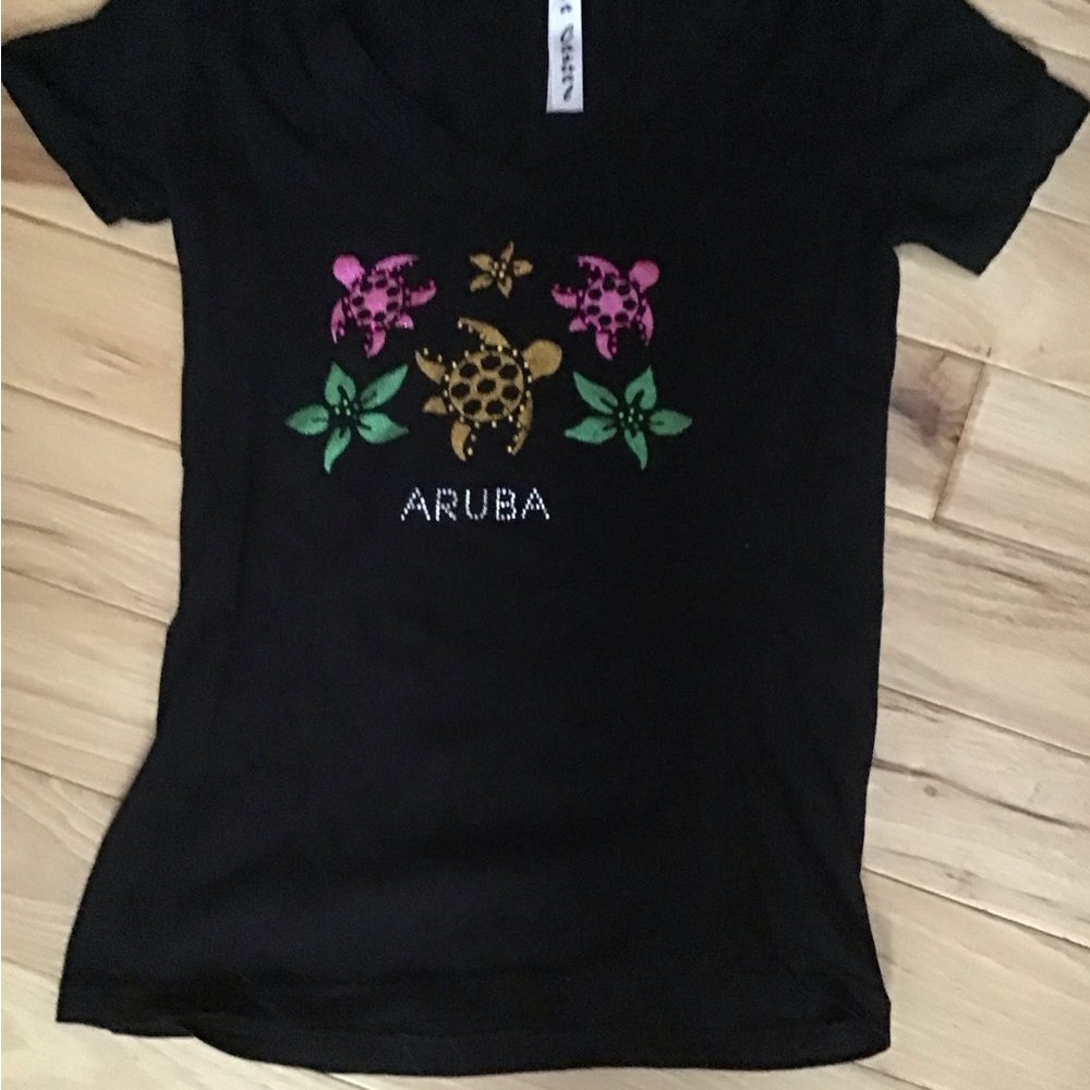 Women’s Aruba Casuals black vneck tshirt with glittery turtles.  Small